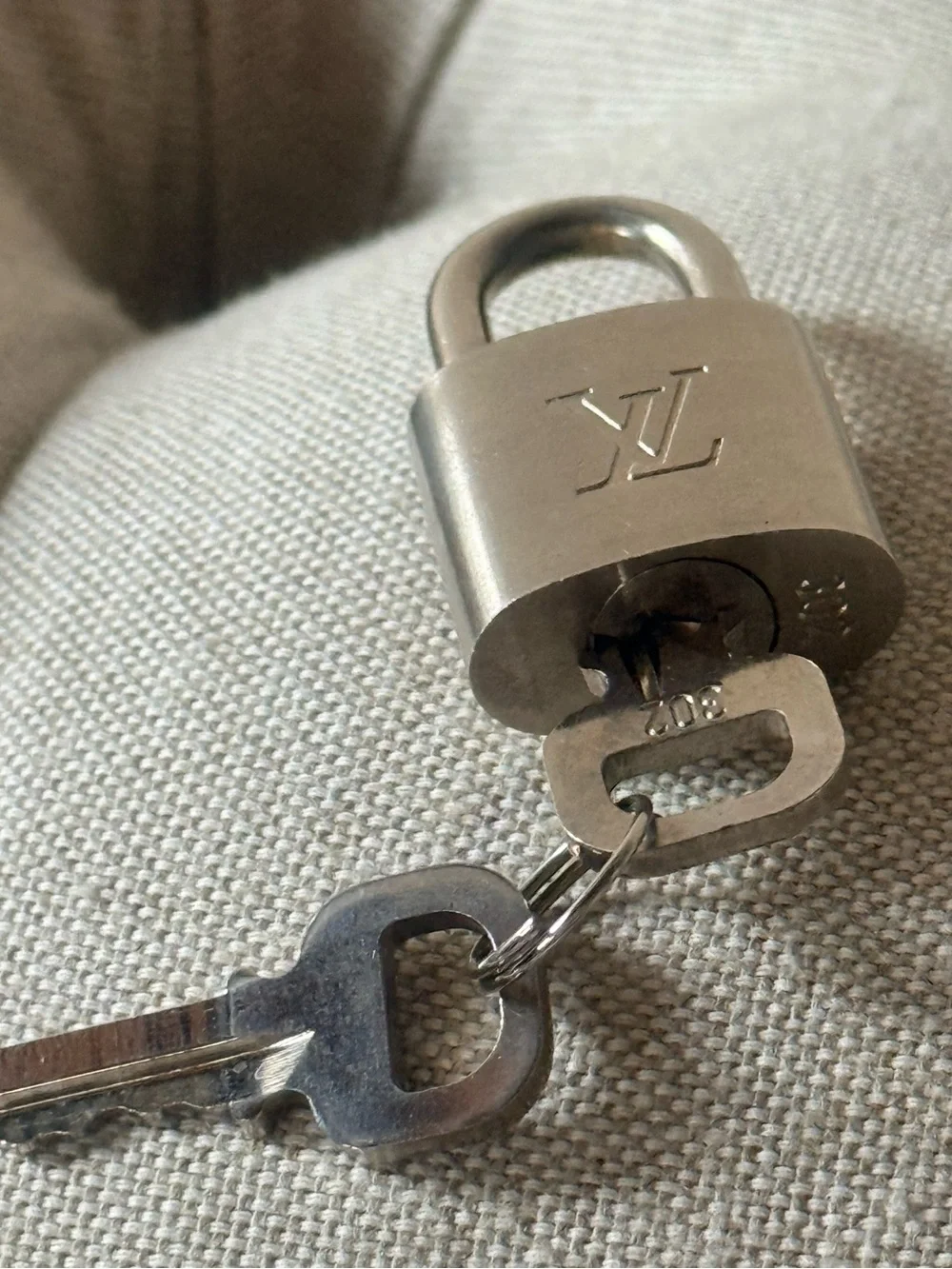 Authentic Louis Vuitton Silver Palladium Padlock and 2 Keys Set 302
